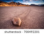 sunset view of The Racetrack Playa, or The Racetrack, is a scenic dry lake feature with "sailing stones" that inscribe linear "racetrack" imprints.