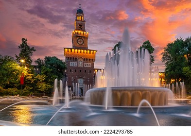 Sunset view of Sforza Castle (Castello Sforzesco) in Milan, Italy. Architecture and landmarks of Milan. Night cityscape of Milan