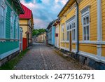 Sunset view of timber buildings at Vanha Rauma district of Rauma in Finland.