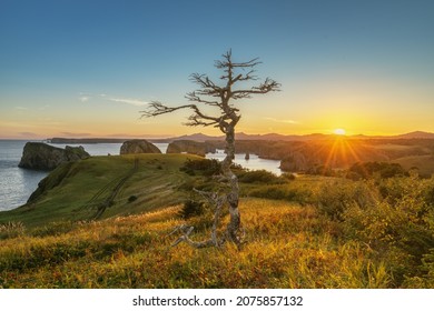 Sunset view of an unnamed bay on the island of Shikotan, Kuril Islands. - Shutterstock ID 2075857132