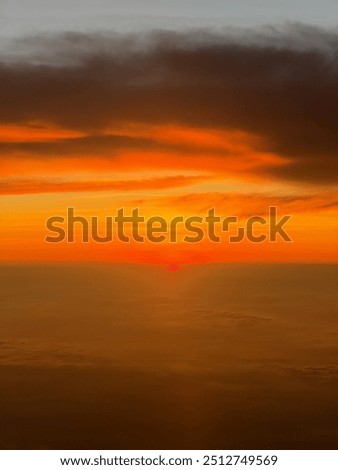 Sunset view which I take from the airplane when flying to Bangkok