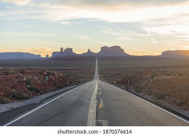 Sunset views of Highway 163 through Monument Valley