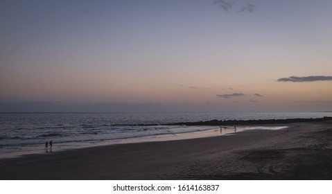 Sunset Walk  On The Beach Of San Agustin, Gran Canaria. 