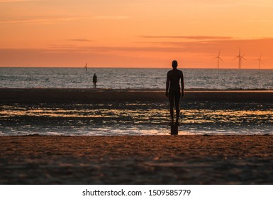 Sunset Walking Along Crosby Beach