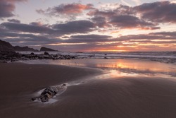 Sunset At Welcombe Mouth Beach In North Devon, England