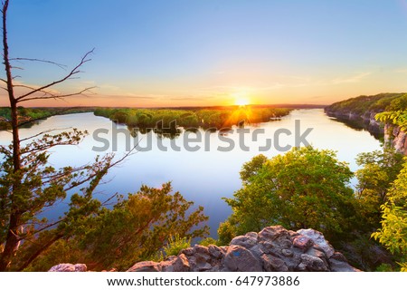 Sunset from where the Sac River and the Osage River comes together at Truman Lake in the Ozarks of Missouri.  This is at Osceola, Missouri