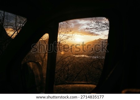 sunset in a window of a Van