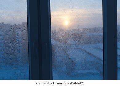 Sunset in the winter window - Powered by Shutterstock