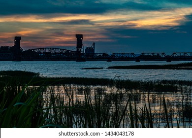Sunsets on a railroad bridge over the Tennessee River in North Alabama - Shutterstock ID 1434043178