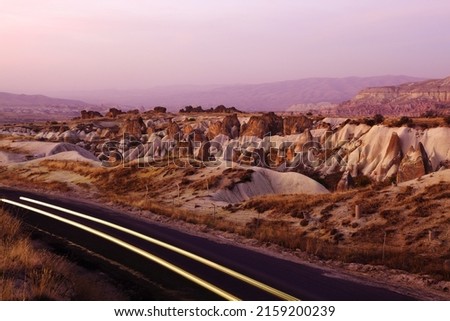 Sunsets over fairy chimney or hoodoo rocks of Goreme - Cappadocia Turkey. 

