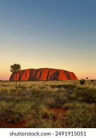Sunsetting over uluru in the outback