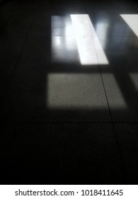 Sunshade through the window made Abstract shadows on the floor. (Take photo by smartphone)