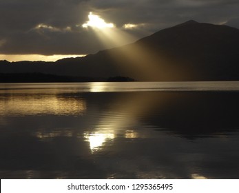 Sunshaft over lake and  mountains, ireland