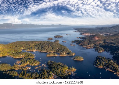 Sunshine Coast, British Columbia, Canada. Aerial View of Beaver Island and Madeira Park during a sunny and hazy summer morning. Art Render