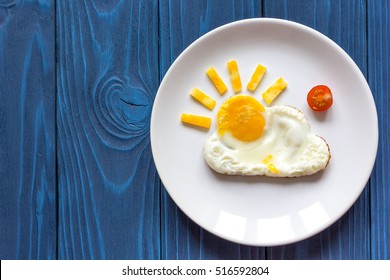 Sunshine Fried Eggs Breakfast For Kid On Blue Background