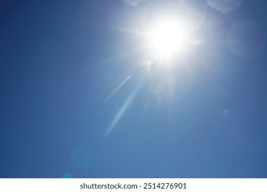 Sunshine lens flare. Light blue heaven shining light religious image background. glitter white light sky empty blank horizontal backdrop with abstract sunburst pattern and a lightning effect.
