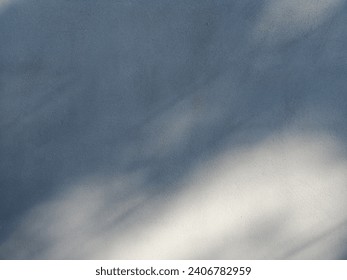 Sunshine on grey cement wall abstrat​ backgroung​