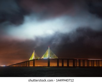 Sunshine Skyway Bridge In Tampa Bay Saint Petersburg Florida At Night In A Stormy Sky