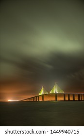 Sunshine Skyway Bridge In Tampa Bay Saint Petersburg Florida At Night In A Stormy Sky