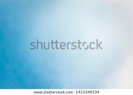 Sunspots on blue water with blur effect background