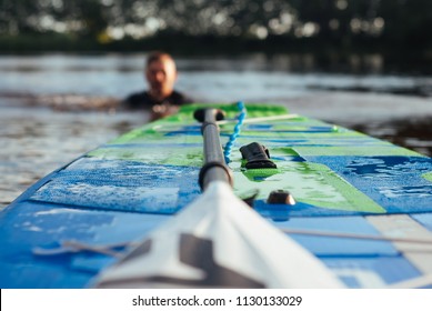 SUP Board and paddle closeup,