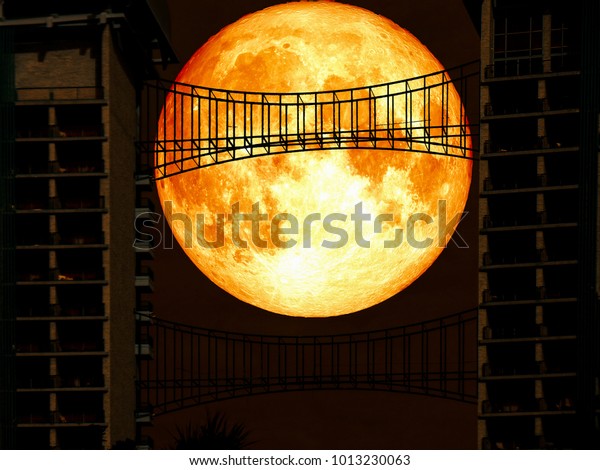 super blue blood moon back middle metal\
bridge, Elements of this image furnished by\
NASA