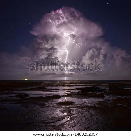 Super cell storm with lightning strike