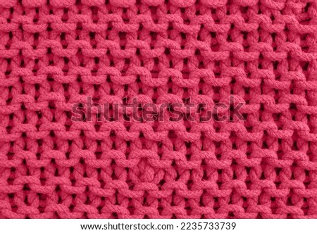 super chunky knitted background. Knitted structure. viva magenta