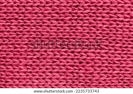 super chunky knitted background. Knitted structure. viva magenta