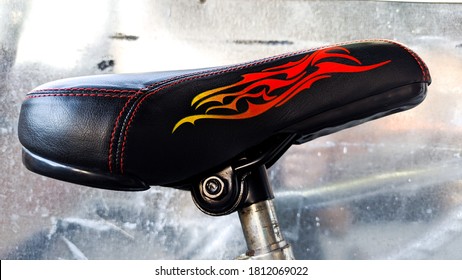 Super cool custom bike seat with red and orange flames