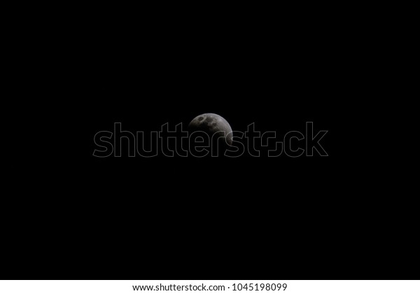 super full moon, blue blood moon, lunar
eclipse on black
background