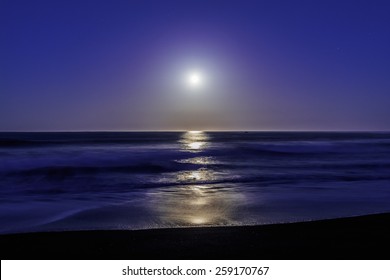 Super / Full Moon Setting / Rising On Moonstone Beach, Along The Big Sur Highway, On The California Central Coast, Near Cambria CA.
