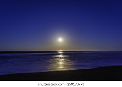 Super / Full Moon Setting / Rising On Moonstone Beach, Along The Big Sur Highway, On The California Central Coast, Near Cambria CA.
