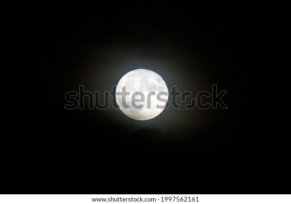 a super full\
moon in the sky during the\
night