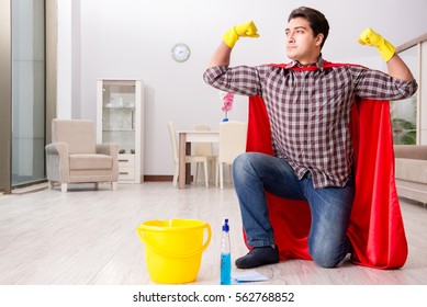 Super Hero Husband Cleaning Floor At Home