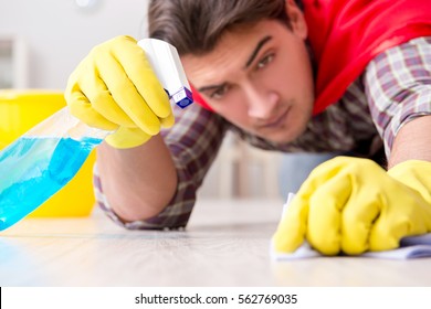 Super Hero Husband Cleaning Floor At Home