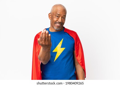Super Hero senior man isolated on white background inviting to come with hand. Happy that you came