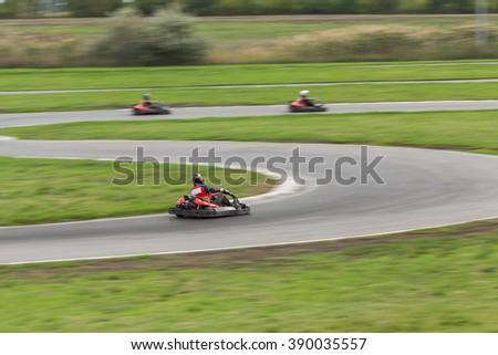 Super kart racing team. The racer on carting. Three Races on cartings. Races on a cross-country terrain. Cars races. Races on long exposure. 