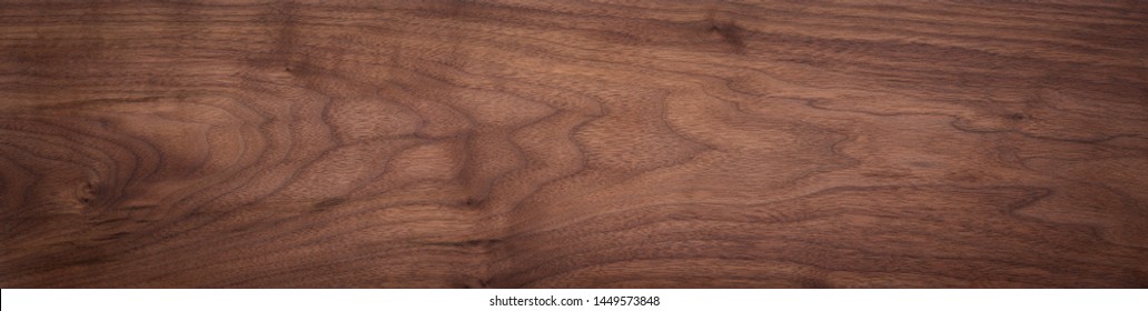 Super long walnut planks texture background.