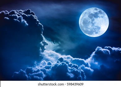 Super moon. Attractive photo of background night sky with cloudy and bright full moon. Nightly sky with beautiful full moon. The moon were NOT furnished by NASA. - Powered by Shutterstock