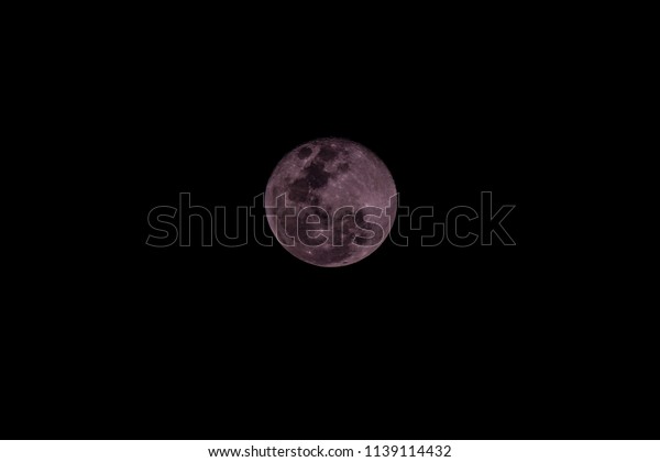 Super moon with dark\
background, Thailand.