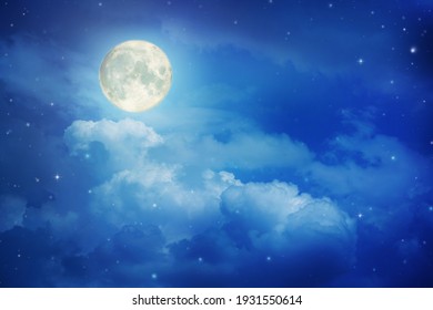 Super moon.Full moon in night sky with the clouds ,Elements of this image furnished by NASA. - Shutterstock ID 1931550614