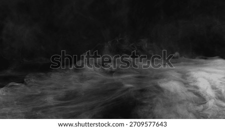 Super Slow Motion of White Surface Smoke Texture Isolated on Bla