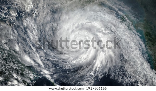 Super Typhoon, tropical storm, cyclone, hurricane,
tornado, over ocean. Weather background. Typhoon,  storm,
windstorm, superstorm, gale moves to the ground.  Elements of this
image furnished by NASA.