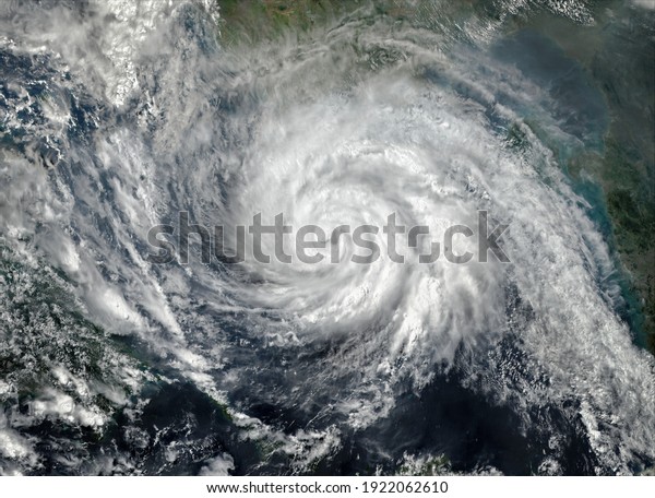 Super Typhoon, tropical storm, cyclone, hurricane,\
tornado, over ocean. Weather background. Typhoon,  storm,\
windstorm, superstorm, gale moves to the ground.  Elements of this\
image furnished by NASA.