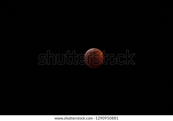 Super wolf  blood moon lunar eclipse at full\
eclipse, red stage -\
1-20-19