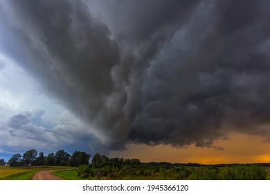 Supercell Storm Clouds With Wall Cloud And Intense Rain