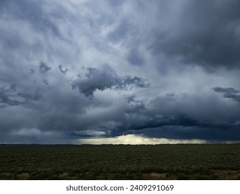 Supercell Thunderstorm Clouds Raining Down Hail and Strong Winds