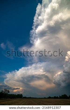 Supercell thunderstorm over corn field in Nebraska Giant clouds