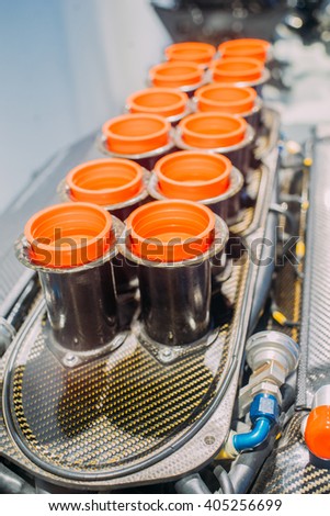 Supercharged V12 engine close up. Shallow focus. 